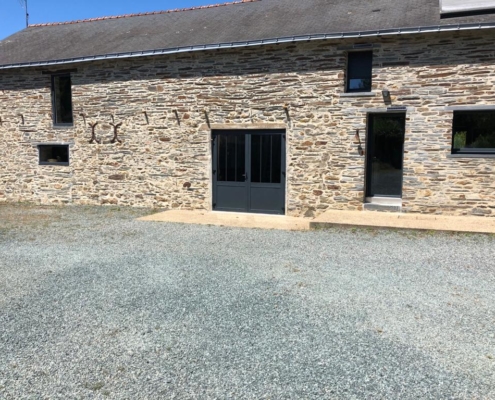 Installation d'une porte en alu à Nantes - Menuiserie du Héron